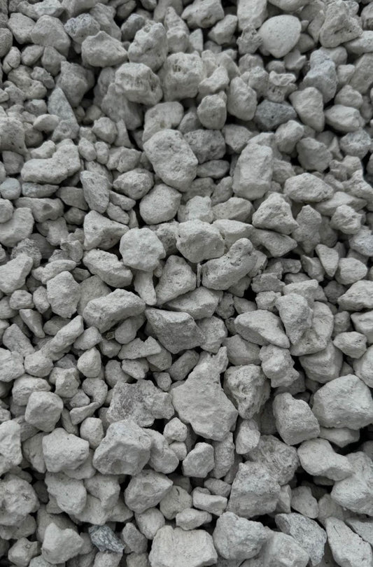 57 Limestone is a versatile and durable crushed stone commonly used for various construction and landscaping projects. Known for its uniform size and excellent drainage properties, this gravel-like material is an essential choice for creating solid foundations and functional outdoor spaces.