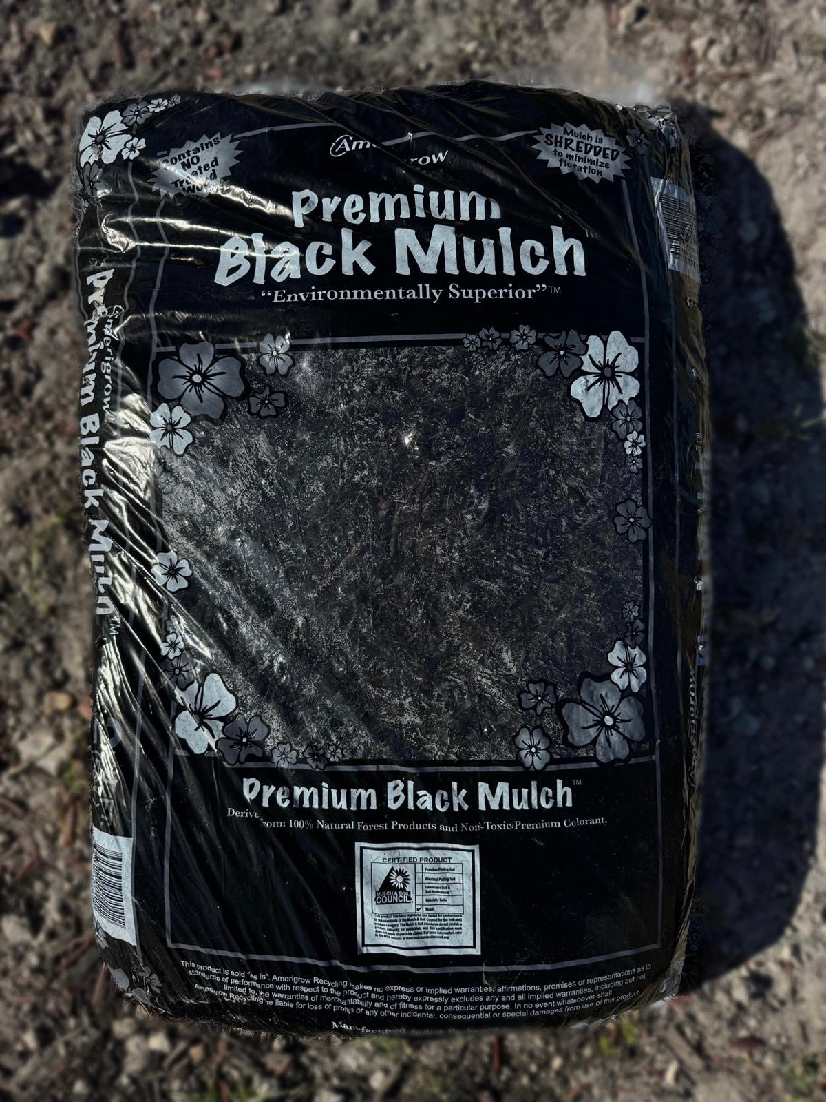 This mulch features a deep, rich black color that adds a sleek, modern look to any outdoor space, made from 100% organic wood. Perfect for flower beds, walkways, and around trees and shrubs, it retains moisture to reduce the need for frequent watering, enhances curb appeal with a striking color contrast, insulates plant roots to protect them from extreme temperatures, and helps control soil erosion on sloped areas. 