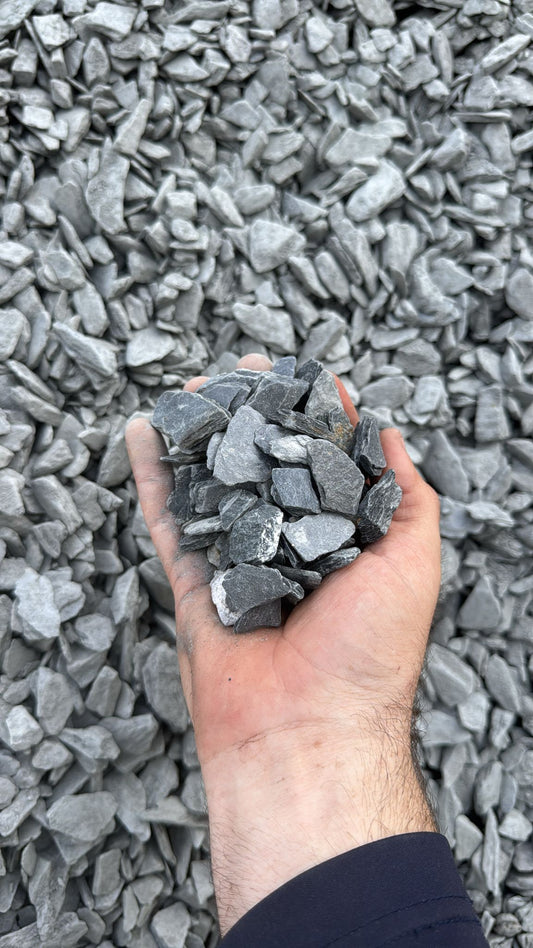 Enhance your landscape with Black Slate Stone Chips, a sleek and modern ground cover ideal for various outdoor projects. Known for their deep black color and natural texture, these stone chips provide a dramatic and refined look that complements any garden, walkway, or decorative feature. 