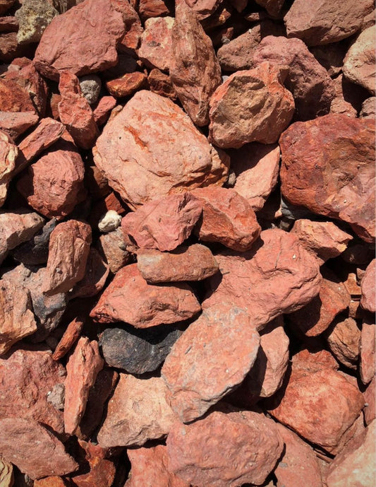Bring warmth and visual interest to your outdoor space with Crimson Red Rock, a decorative ground cover that adds bold color and durable nature. Ideal for gardens, pathways, and as a mulch alternative, these durable rock chips offer a unique and attractive look with minimal maintenance.
