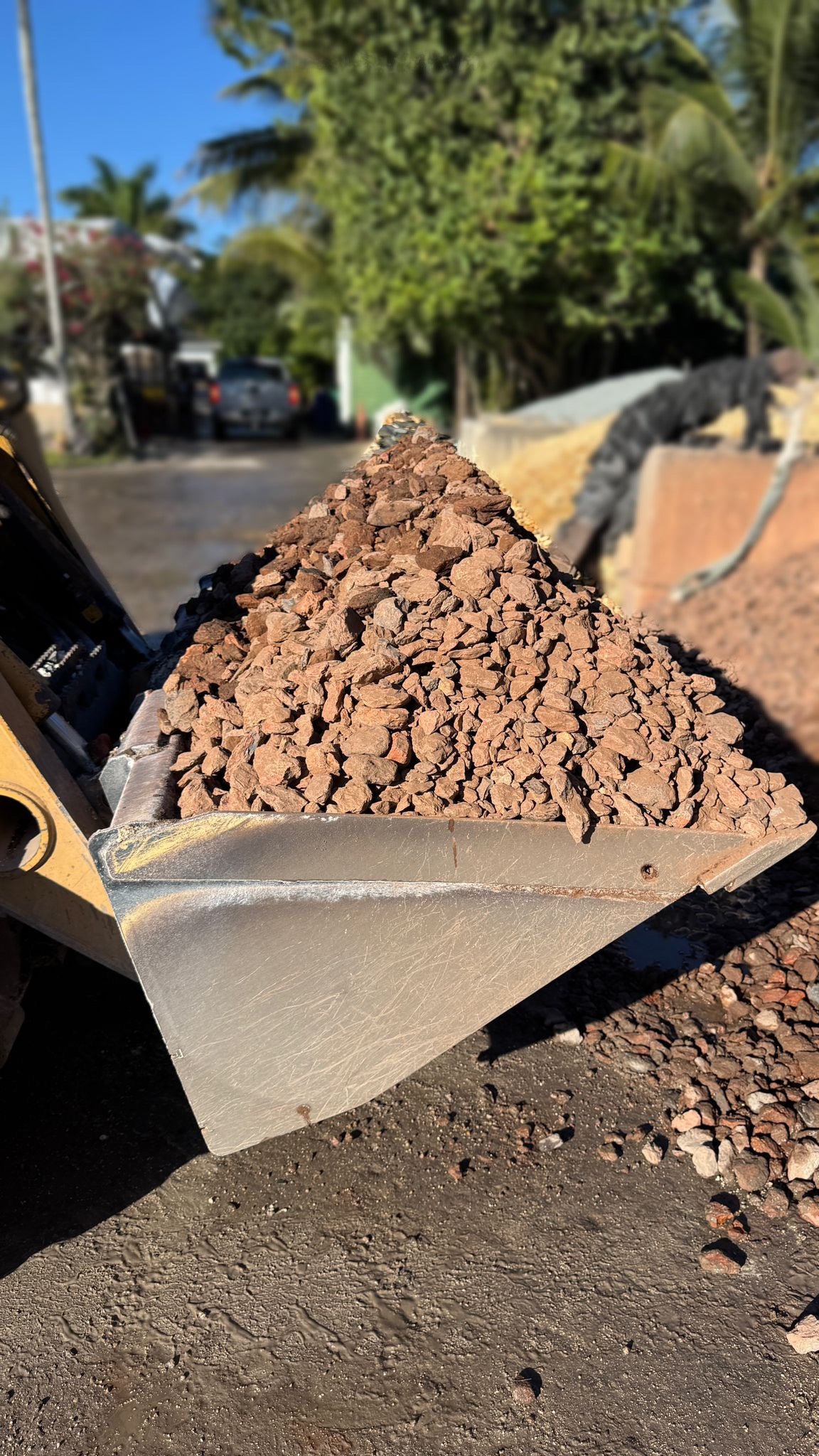 Bring warmth and visual interest to your outdoor space with Crimson Red Rock, a decorative ground cover that adds bold color and durable nature. Ideal for gardens, pathways, and as a mulch alternative, these durable rock chips offer a unique and attractive look with minimal maintenance.