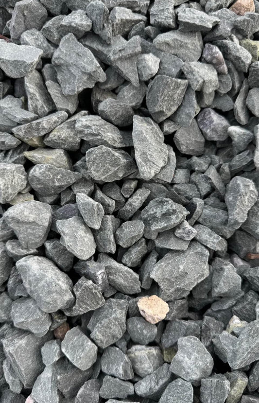 Enhance your landscape with Palmetto Green Granite, a premium decorative stone that combines durability with natural beauty. These attractive, green-toned granite stones are ideal for pathways, garden beds, borders, and ground cover, adding a refined look that complements any outdoor space.