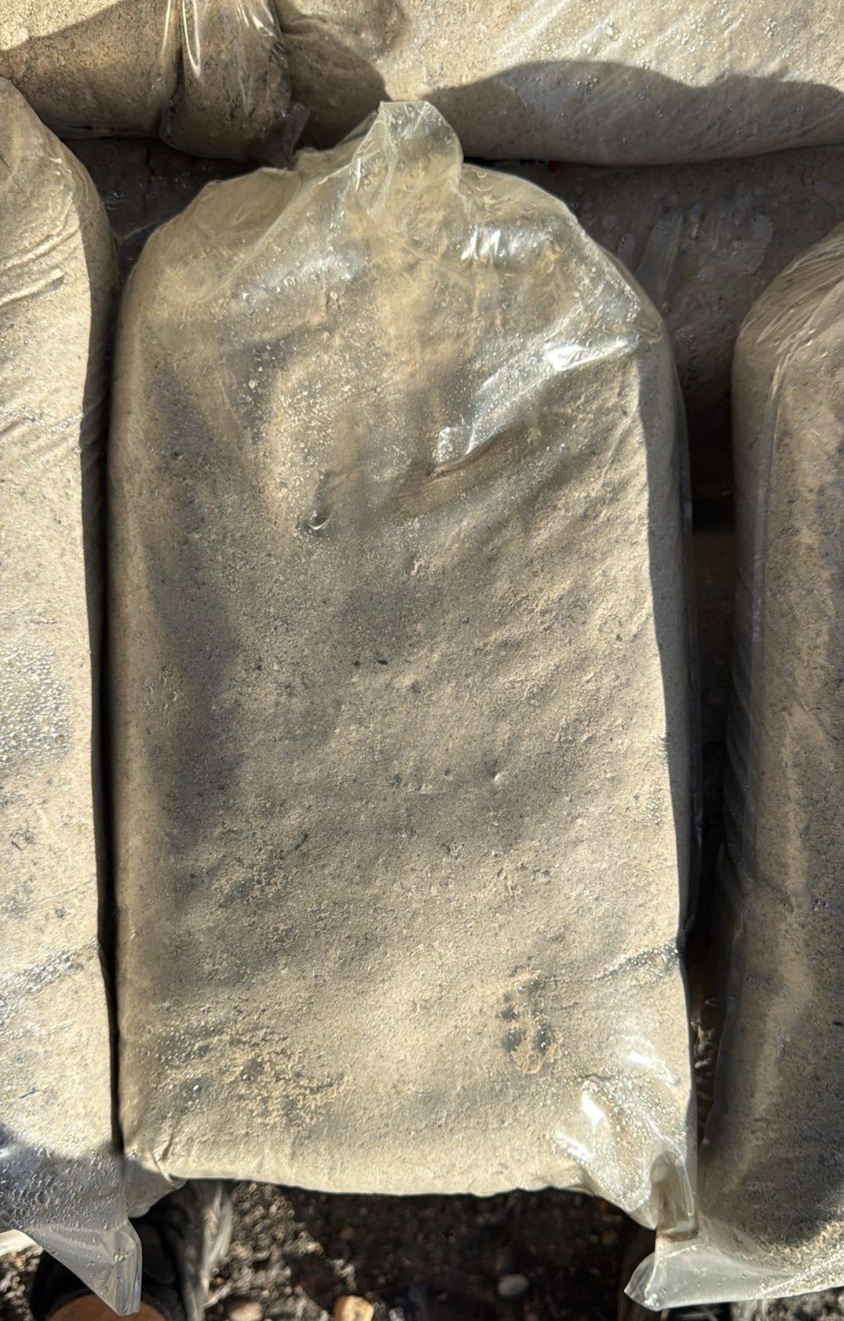 Pavers base sand is a fine aggregate material ideal for a range of construction and landscaping applications. This high-quality sand is precisely screened to ensure uniform particle size, making it the perfect choice for mixing with cement, leveling, and providing a stable base for pavers and other hardscape projects.