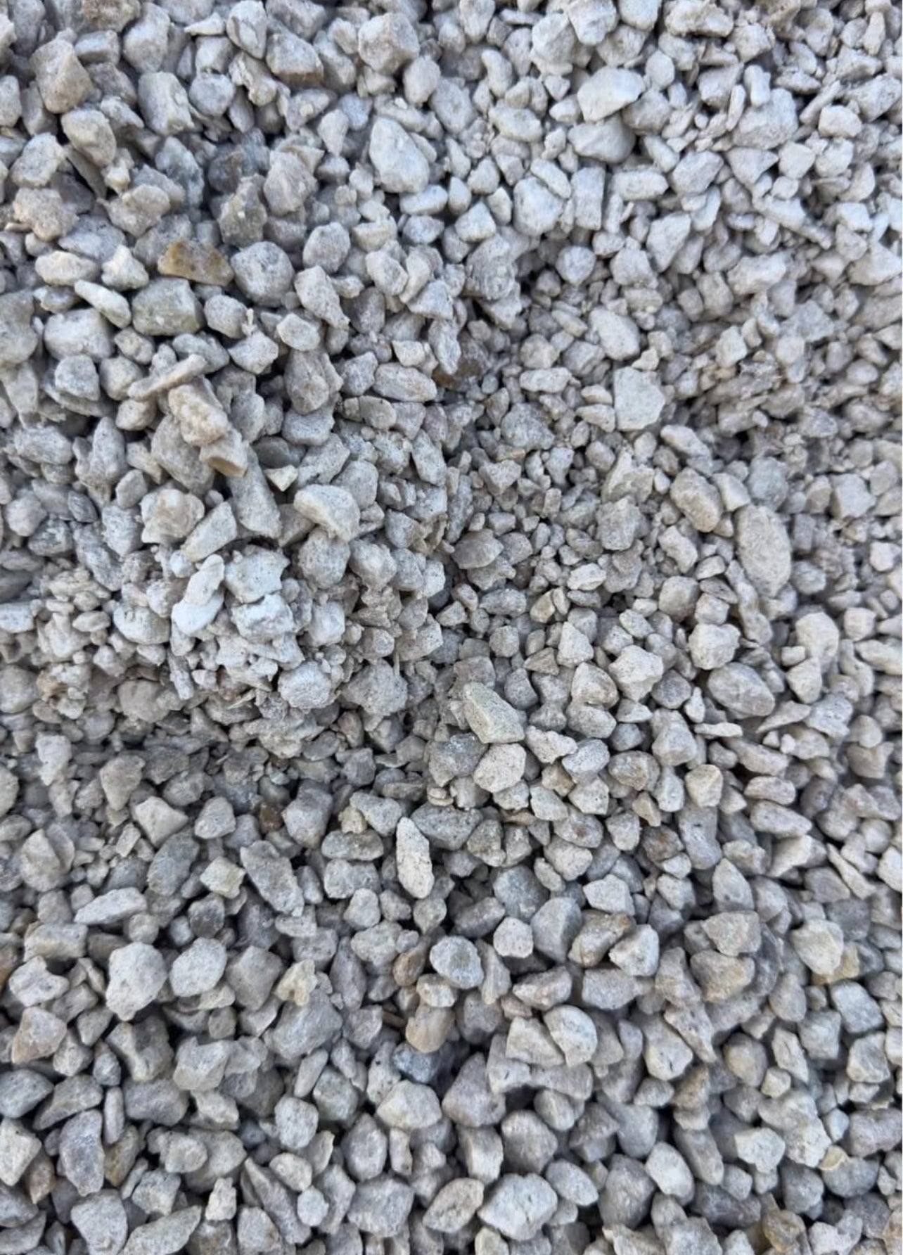 Pea Rock, also known as Pea Gravel, is a small, smooth stone commonly used in landscaping and construction projects. Known for its rounded shape and varied colors, this versatile aggregate is ideal for both decorative and functional purposes in outdoor settings.