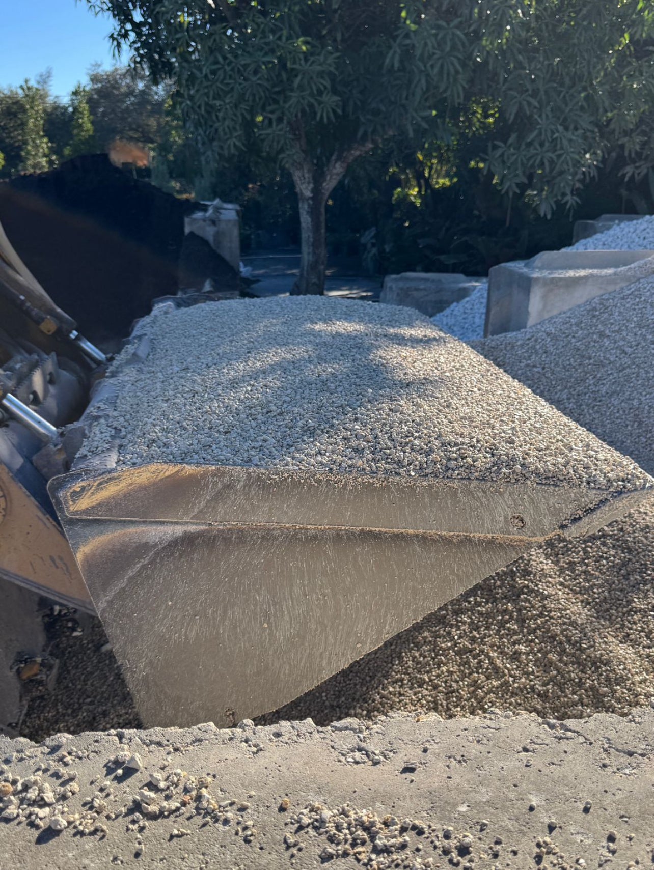 Pea Rock, also known as Pea Gravel, is a small, smooth stone commonly used in landscaping and construction projects. Known for its rounded shape and varied colors, this versatile aggregate is ideal for both decorative and functional purposes in outdoor settings.