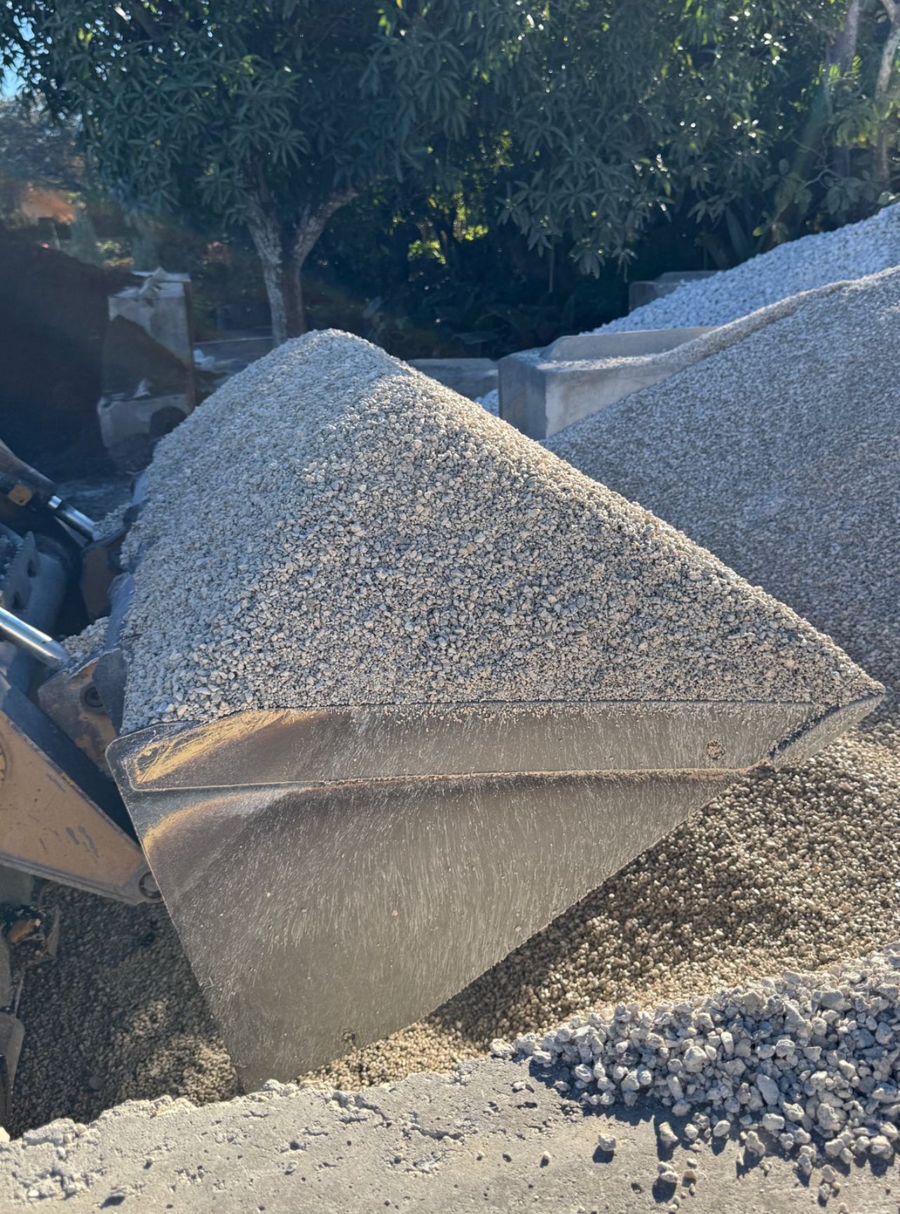 Pea Rock, also known as Pea Gravel, is a small, smooth stone commonly used in landscaping and construction projects. Known for its rounded shape and varied colors, this versatile aggregate is ideal for both decorative and functional purposes in outdoor settings.