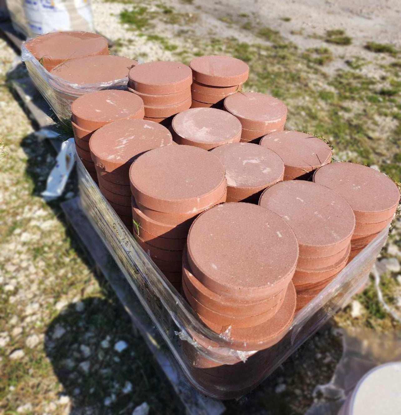 These vibrant red pavers add a touch of elegance and charm to any landscaping project. Perfect for patios, walkways, driveways, and garden paths, their round shape offers unique design possibilities. Made from durable materials, these pavers are built to withstand the elements and provide long-lasting beauty. Easy to install and maintain, Round Red Pavers are the ideal choice for creating a stunning outdoor environment.