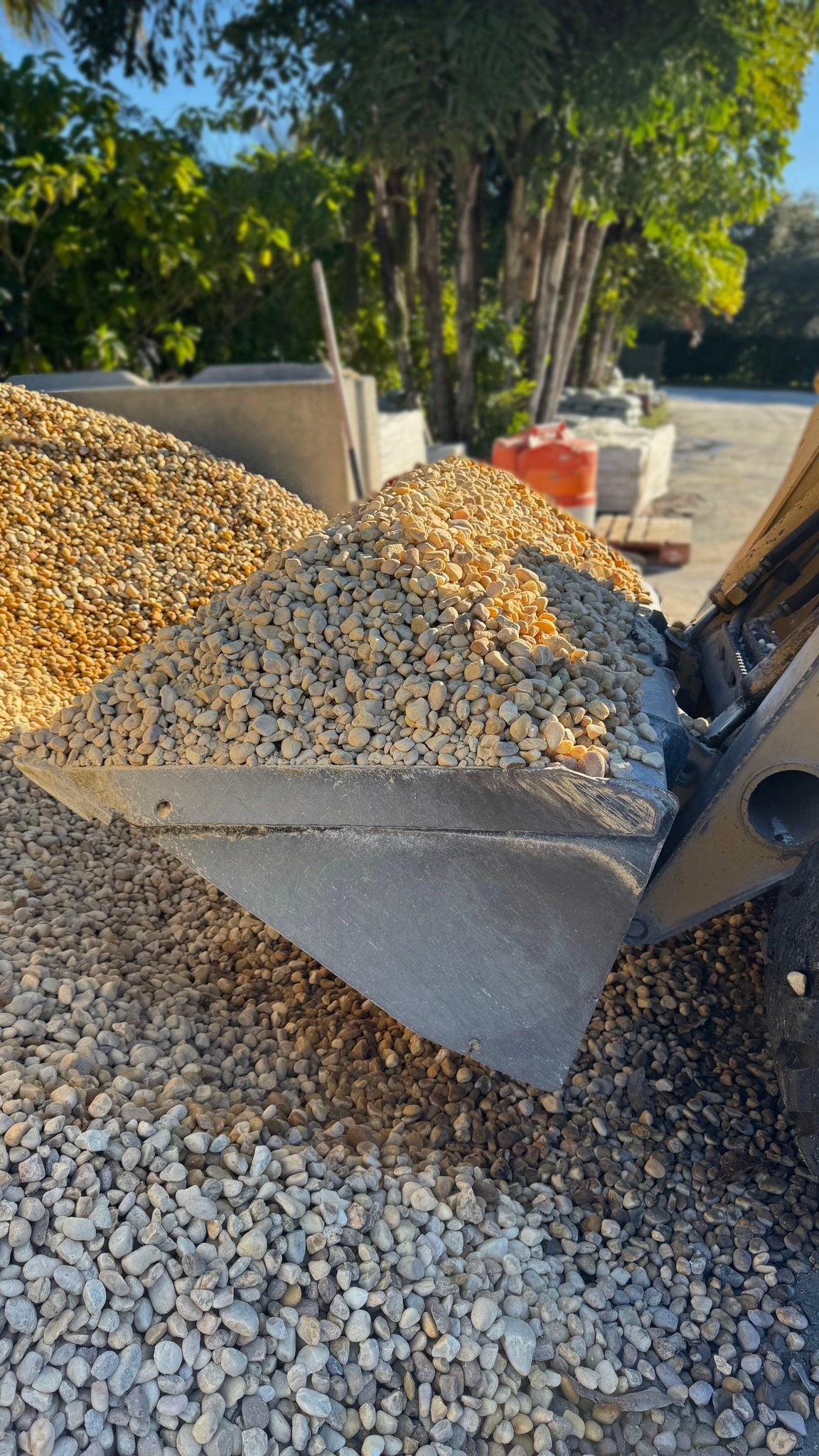 Bring a clean, polished look to your outdoor space with our smooth, rounded White River Rock. These stones are ideal for creating a fresh, modern aesthetic in gardens, pathways, water features, and more. 
Perfect for garden beds, walkways, patios, and accenting ponds or fountains. Adds a beautiful, versatile solution for erosion control and low-maintenance ground cover.