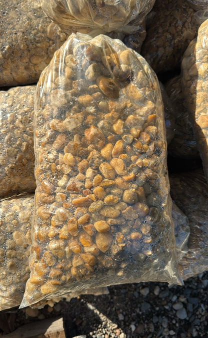 These smooth, rounded stones are ideal for garden beds, walkways, patios, and as decorative accents around ponds or fountains. Perfect for erosion control and drainage areas, Brown River Rock is durable, low-maintenance, and versatile, giving any landscape design a polished, natural look.