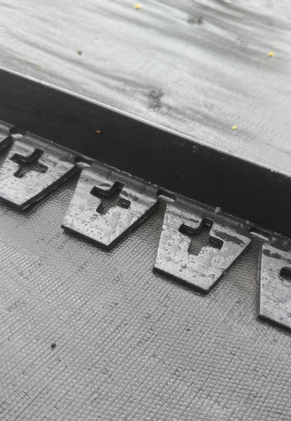 This 15-foot edging system anchors easily with stakes, keeping hardscape elements in place for a clean, professional look. Ideal for walkways, patios, and garden edges, this flexible border can be cut to size to fit any project.