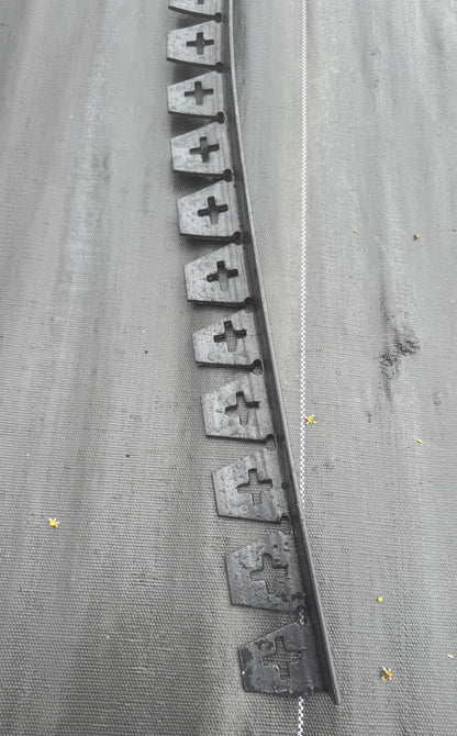 This 15-foot edging system anchors easily with stakes, keeping hardscape elements in place for a clean, professional look. Ideal for walkways, patios, and garden edges, this flexible border can be cut to size to fit any project.