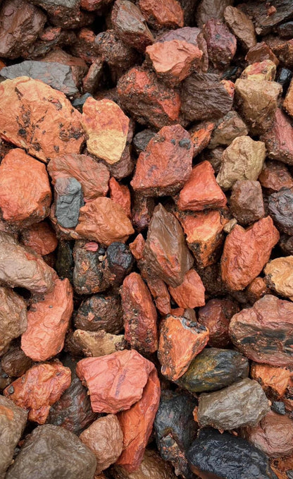 Bring warmth and visual interest to your outdoor space with Crimson Red Rock, a decorative ground cover that adds bold color and durable nature. Ideal for gardens, pathways, and as a mulch alternative, these durable rock chips offer a unique and attractive look with minimal maintenance. 