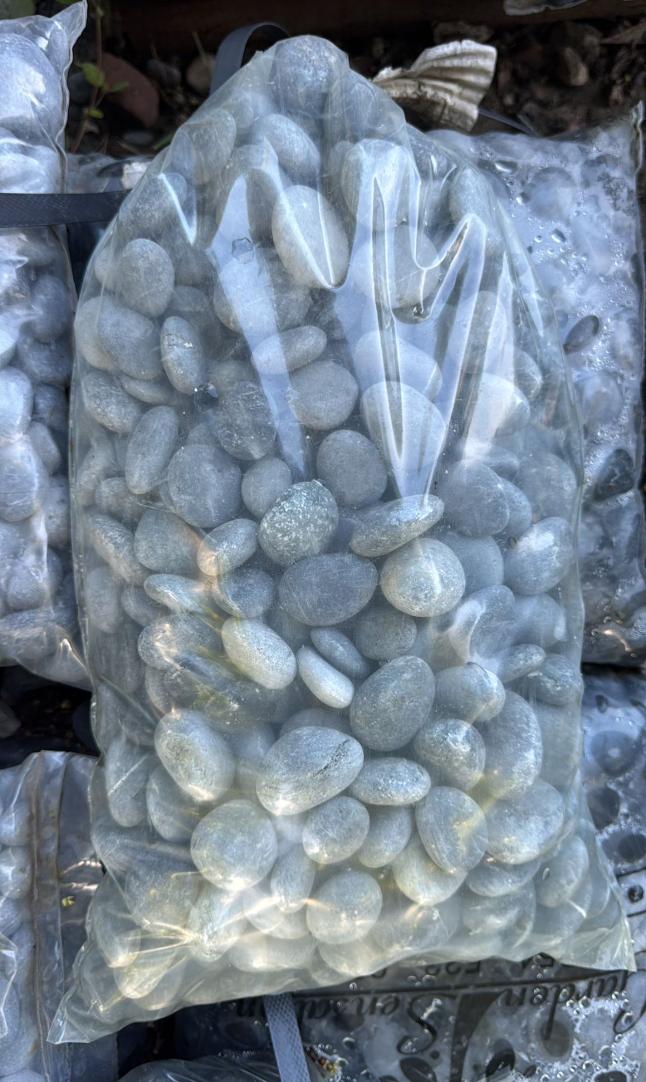 Enhance your outdoor spaces with high-quality gray rock, perfect for garden beds, pathways, and various landscape designs. This durable and long-lasting rock is versatile, ideal for edging, drainage, or decorative use. Its natural, non-polished texture provides a rustic look suitable for any outdoor project. 