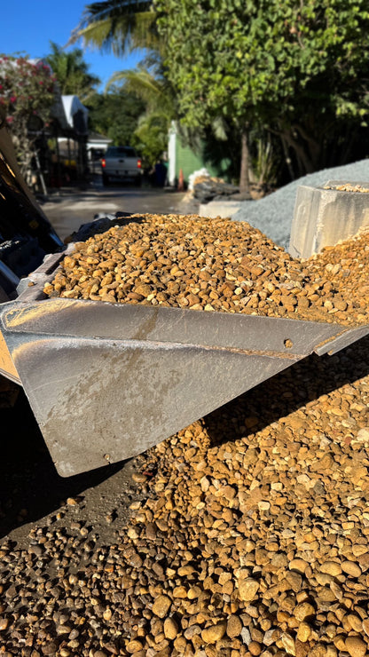 These smooth, rounded stones are ideal for garden beds, walkways, patios, and as decorative accents around ponds or fountains. Perfect for erosion control and drainage areas, Brown River Rock is durable, low-maintenance, and versatile, giving any landscape design a polished, natural look.