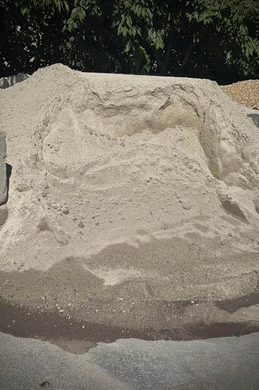 Pavers base sand is a fine aggregate material ideal for a range of construction and landscaping applications. This high-quality sand is precisely screened to ensure uniform particle size, making it the perfect choice for mixing with cement, leveling, and providing a stable base for pavers and other hardscape projects.
