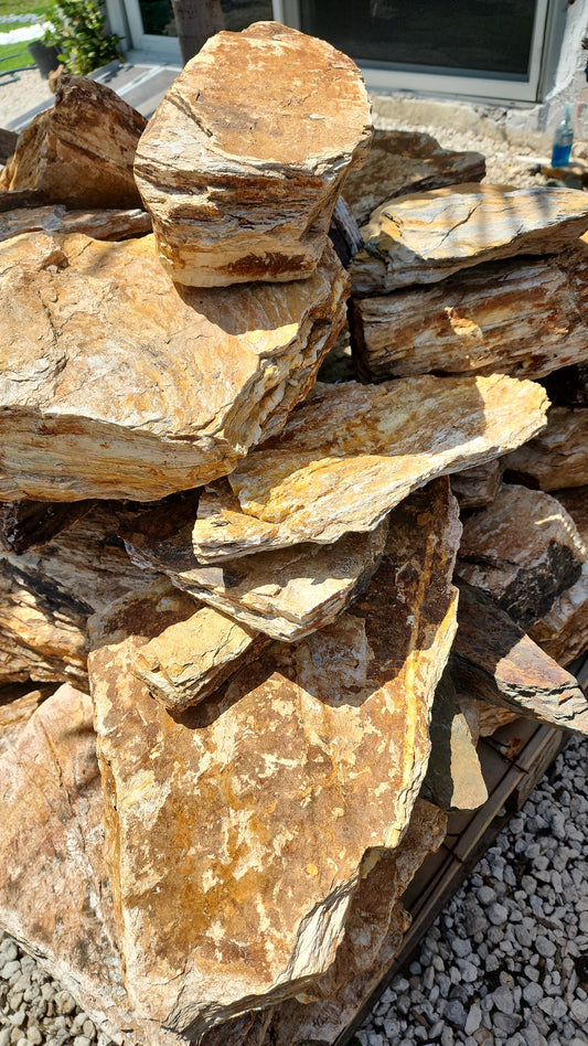 Each piece boasts unique textures and colors, adding a touch of elegance and authenticity to your outdoor space. Perfect for pathways, garden beds, and decorative accents, these versatile stones are durable and easy to work with.